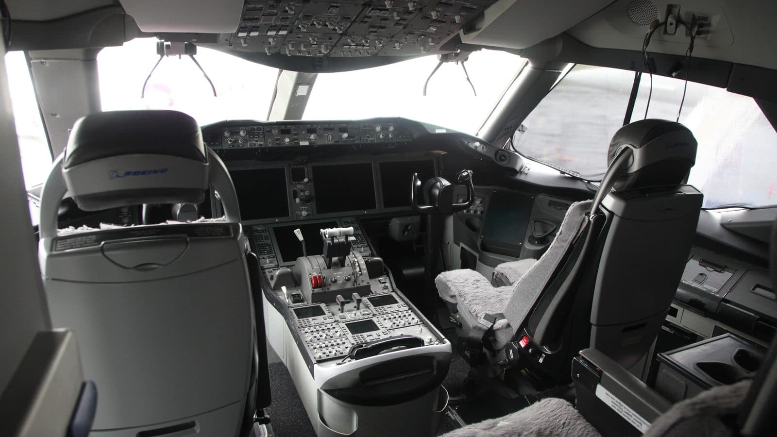Boeing 787 flight deck on display at the Museum of Flight near Seattle, with both pilot seats empty