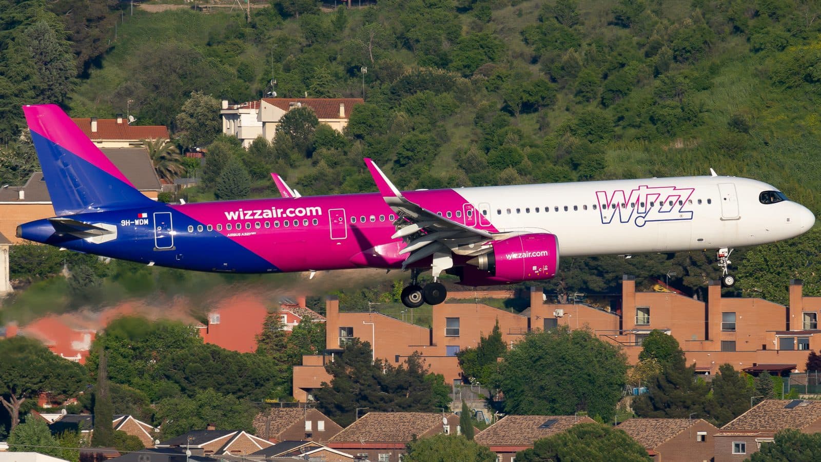 A Wizz Air Malta Airbus A321neo, registration 9H-WDM, on short final